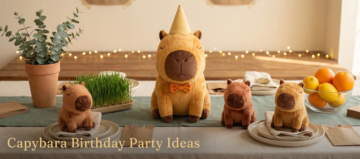 Birthday capybara plush in a party hat and bow tie at a party table with wheatgrass, fairy lights and small capybaras on plates