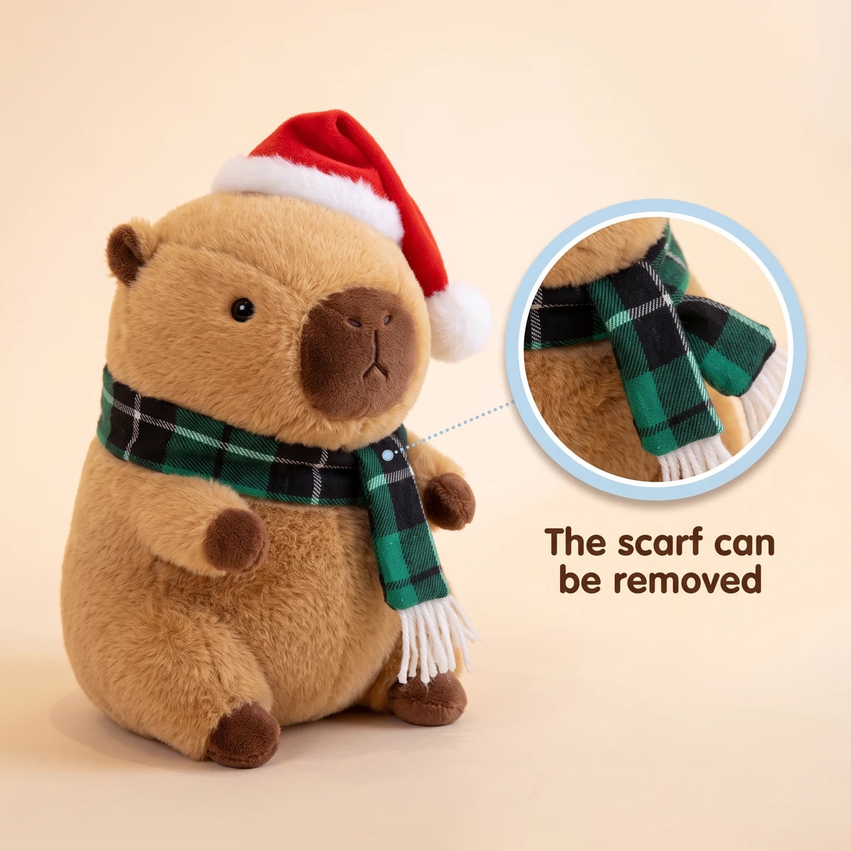 Christmas capybara plush with a Santa hat and a green plaid scarf with a close-up showing that the scarf can be removed