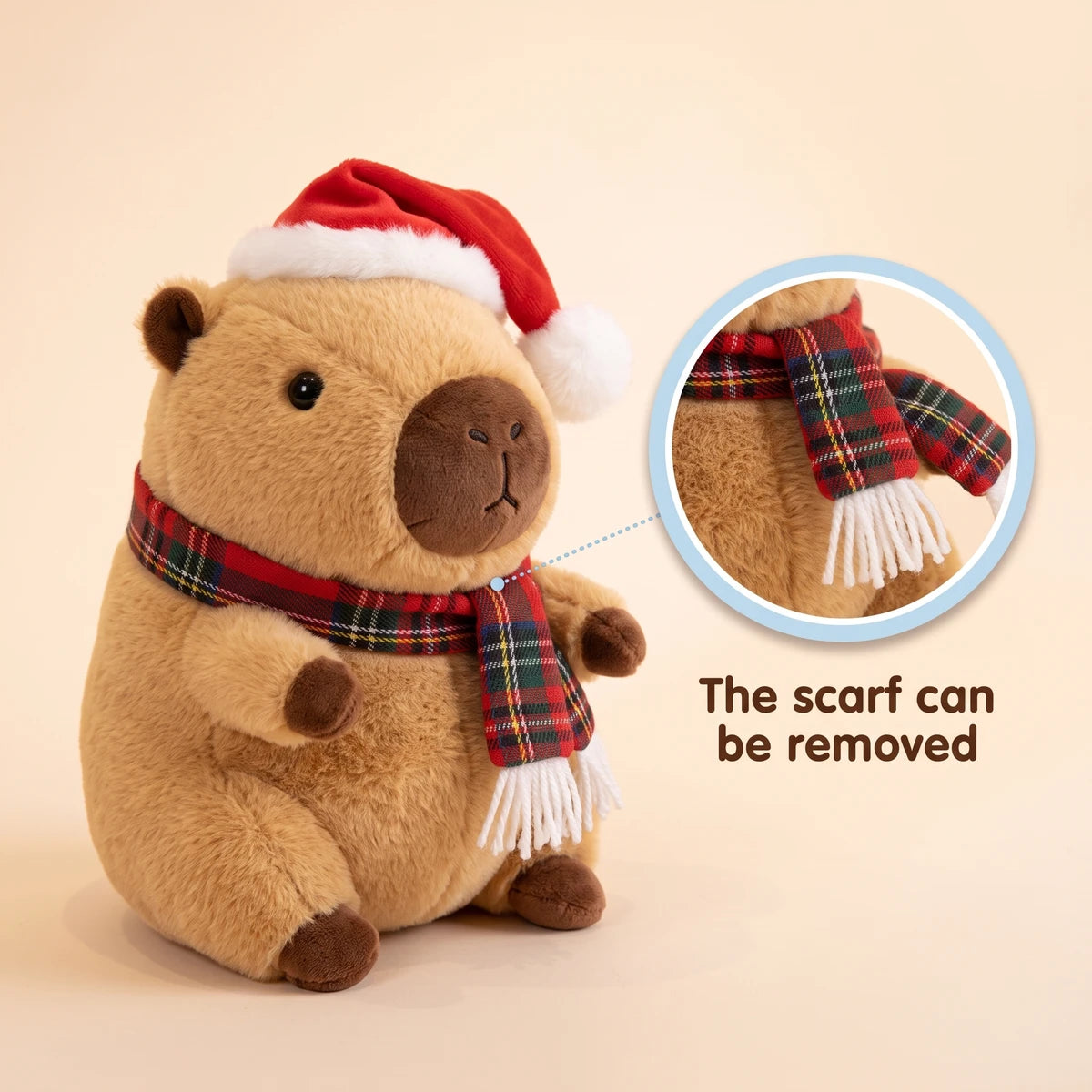 Christmas capybara plush with a Santa hat and a red tartan scarf with a close-up showing that the scarf can be removed