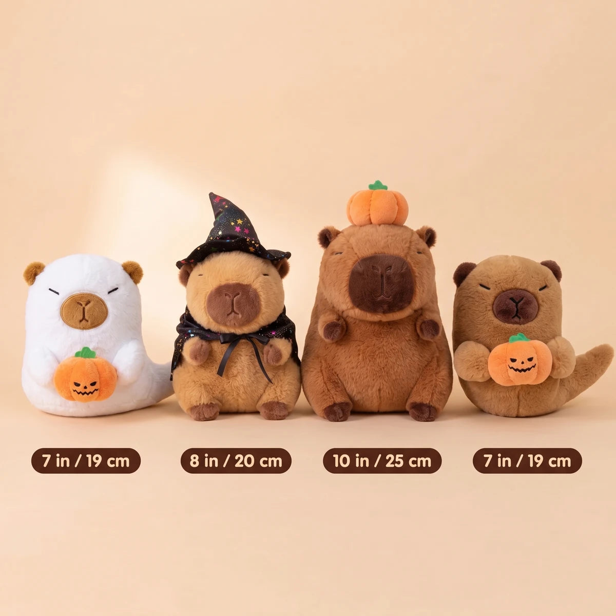 Size chart of the Halloween capybara plush set: 7 in, 8 in, 10 in and 7 in