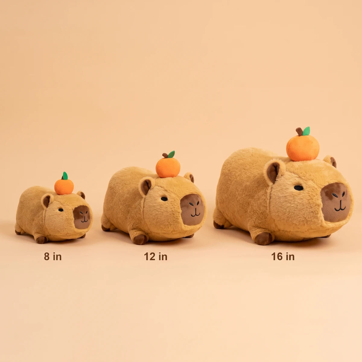 Lying capybara plush in three sizes: 8 in, 12 in and 16 in
