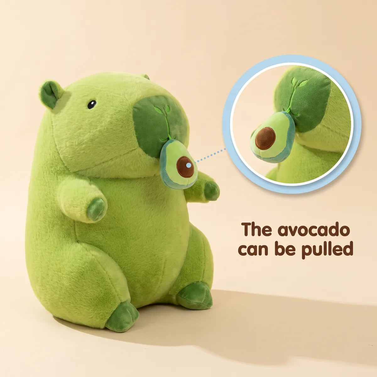 Green capybara plush with an inset close-up noting that the plush avocado can be pulled