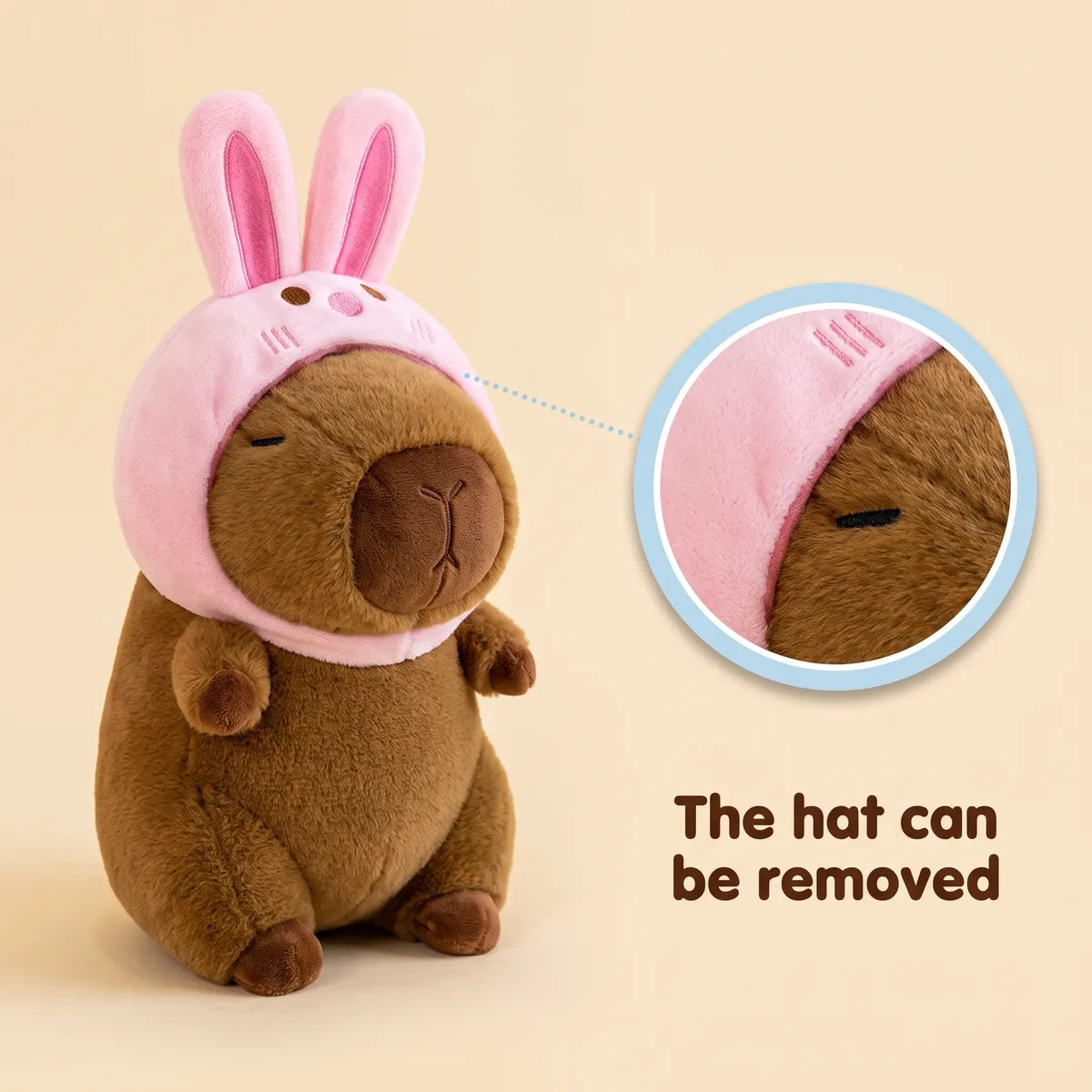 Bunny capybara plush shown with the pink rabbit hood taken off