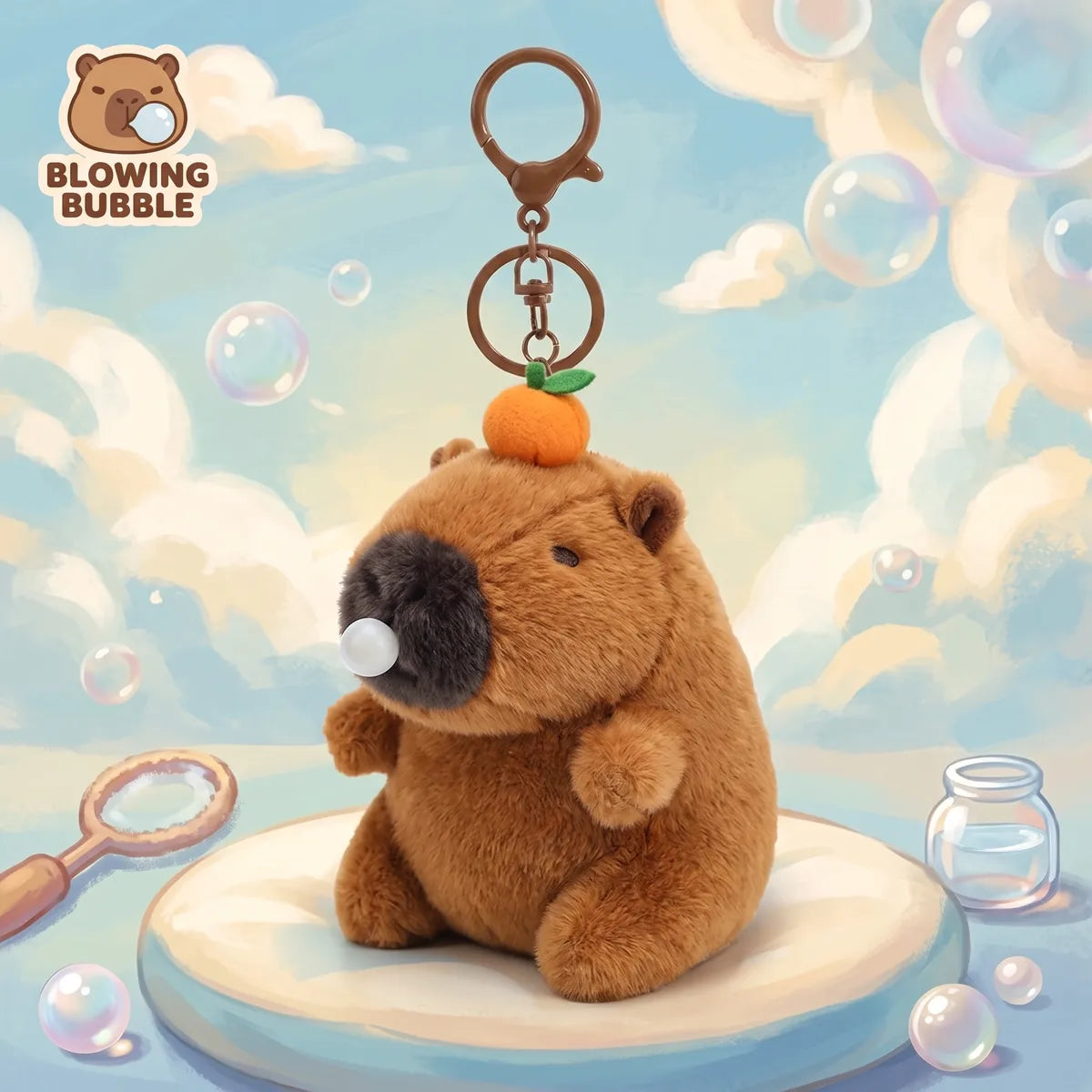 Illustrated artwork of the capybara blowing bubble keychain plush sitting on a cloud podium in a pastel sky full of soap bubbles, with a BLOWING BUBBLE badge in the corner