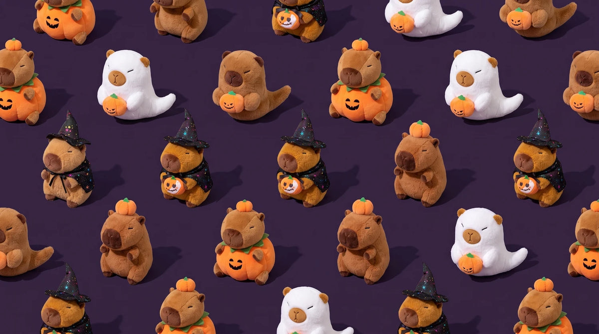 Halloween capybara plush collection: pumpkin capybaras, ghost capybaras and witch capybaras on a deep purple background