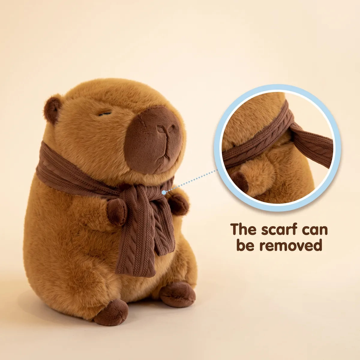 Scarf capybara plush shown with the cable knit scarf lifted off over its head