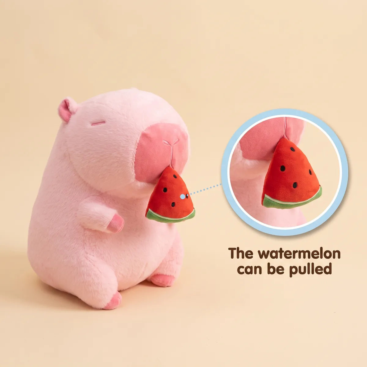 Watermelon capybara plush shown with the watermelon wedge pulled away from its mouth